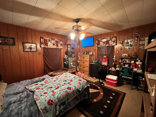 a bedroom with a bed and a closet