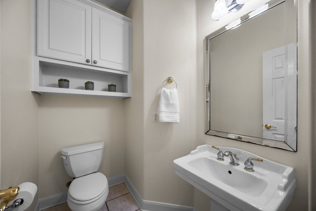 211 River Down Road Georgetown, TX 78628 - Photo 20 of 39 The conveniently located powder bath provides easy access for guests and everyday use.