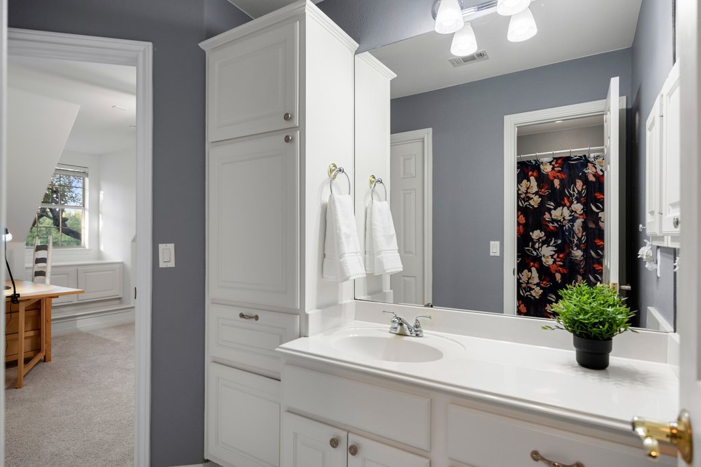211 River Down Road Georgetown, TX 78628 - Photo 24 of 39 A spacious vanity provides ample counter space and storage for daily essentials.