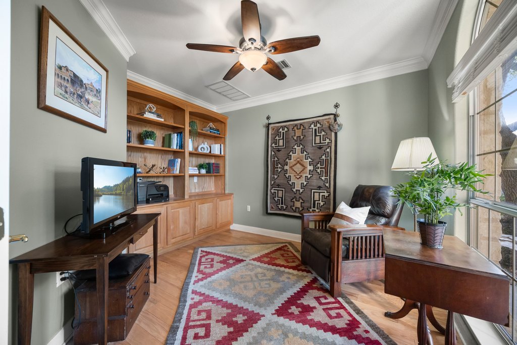 211 River Down Road Georgetown, TX 78628 - Photo 3 of 39 The private home office provides a quiet space ideal for working remotely or studying.