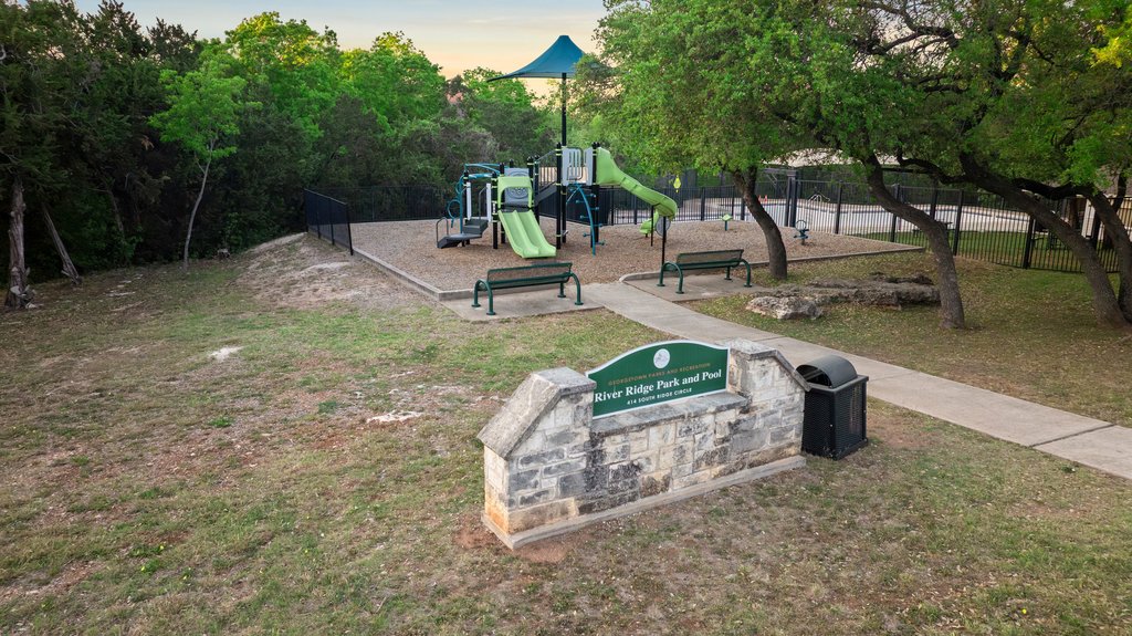 211 River Down Road Georgetown, TX 78628 - Photo 35 of 39 Residents enjoy close proximity to a nearby community park featuring a playscape and open green space.