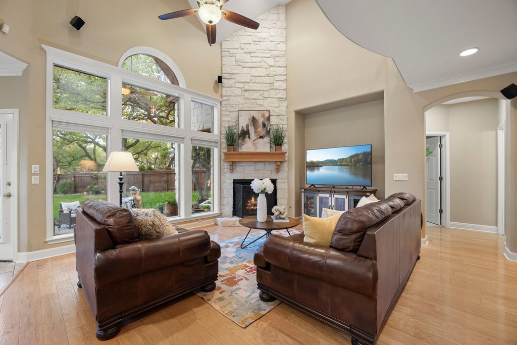 211 River Down Road Georgetown, TX 78628 - Photo 6 of 39 Expansive windows allow natural light to pour into the living space throughout the day.