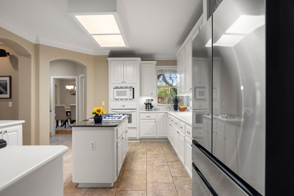 211 River Down Road Georgetown, TX 78628 - Photo 10 of 39 Positioned near the main living areas, the kitchen provides easy flow for gatherings and daily life.