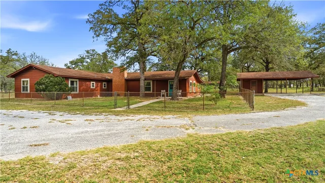 a view of a house with a swimming pool