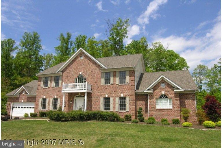 7816 Pohick Road Springfield, VA 22153 - Photo 1 of 30 front view of a house with a yard