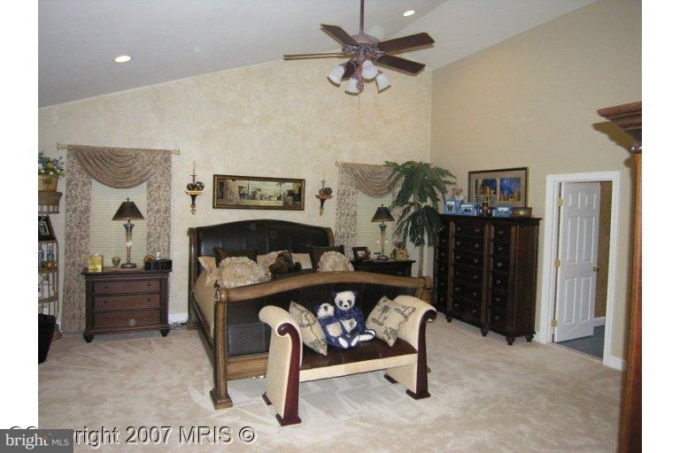 7816 Pohick Road Springfield, VA 22153 - Photo 14 of 30 a living room with furniture and a table