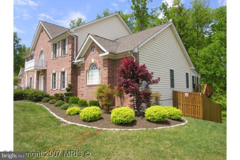 7816 Pohick Road Springfield, VA 22153 - Photo 18 of 30 a view of multiple house with garden and plants