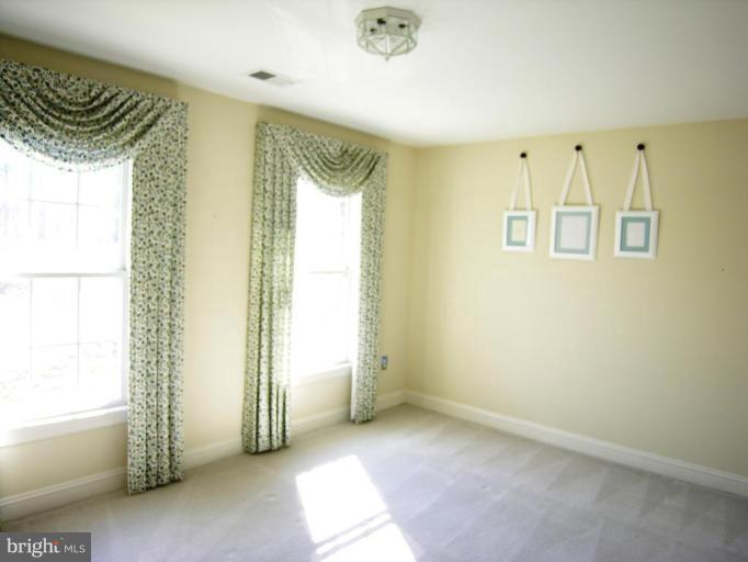 7816 Pohick Road Springfield, VA 22153 - Photo 21 of 30 a view of a room with an entryway