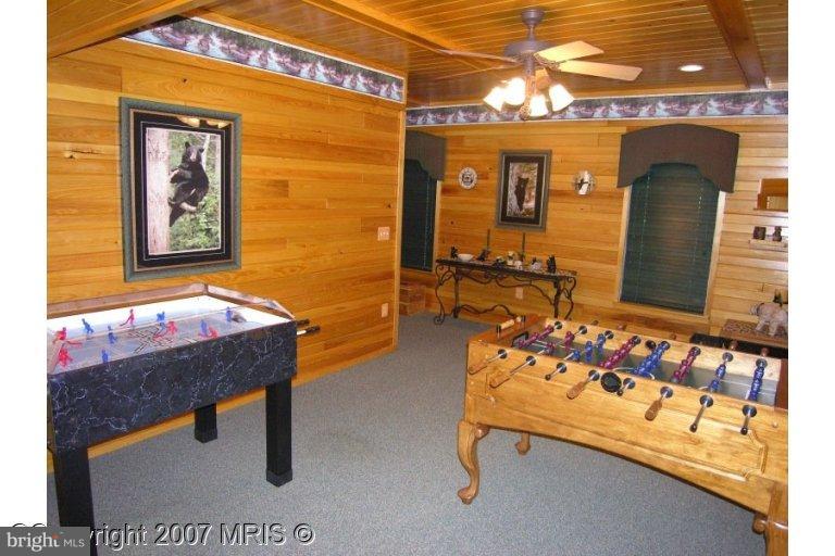 7816 Pohick Road Springfield, VA 22153 - Photo 6 of 30 a room with pool table and windows