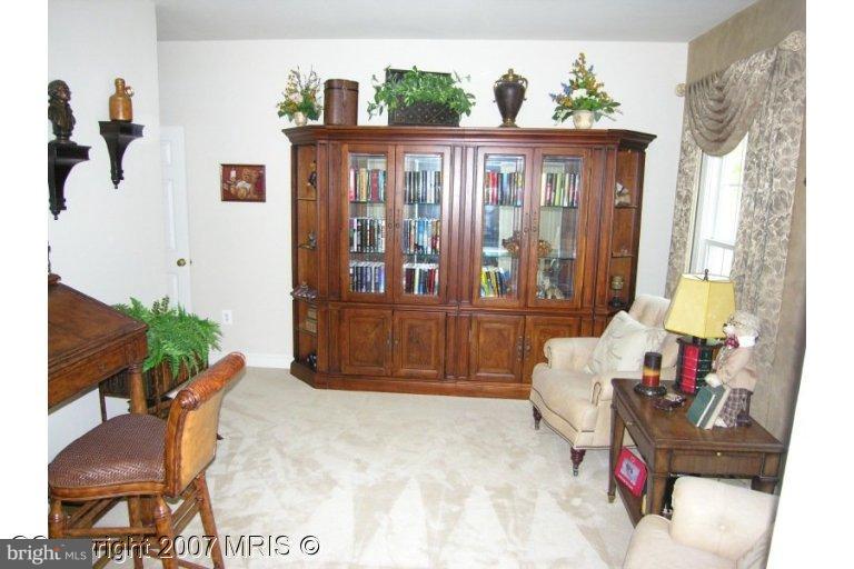7816 Pohick Road Springfield, VA 22153 - Photo 10 of 30 a living room with furniture
