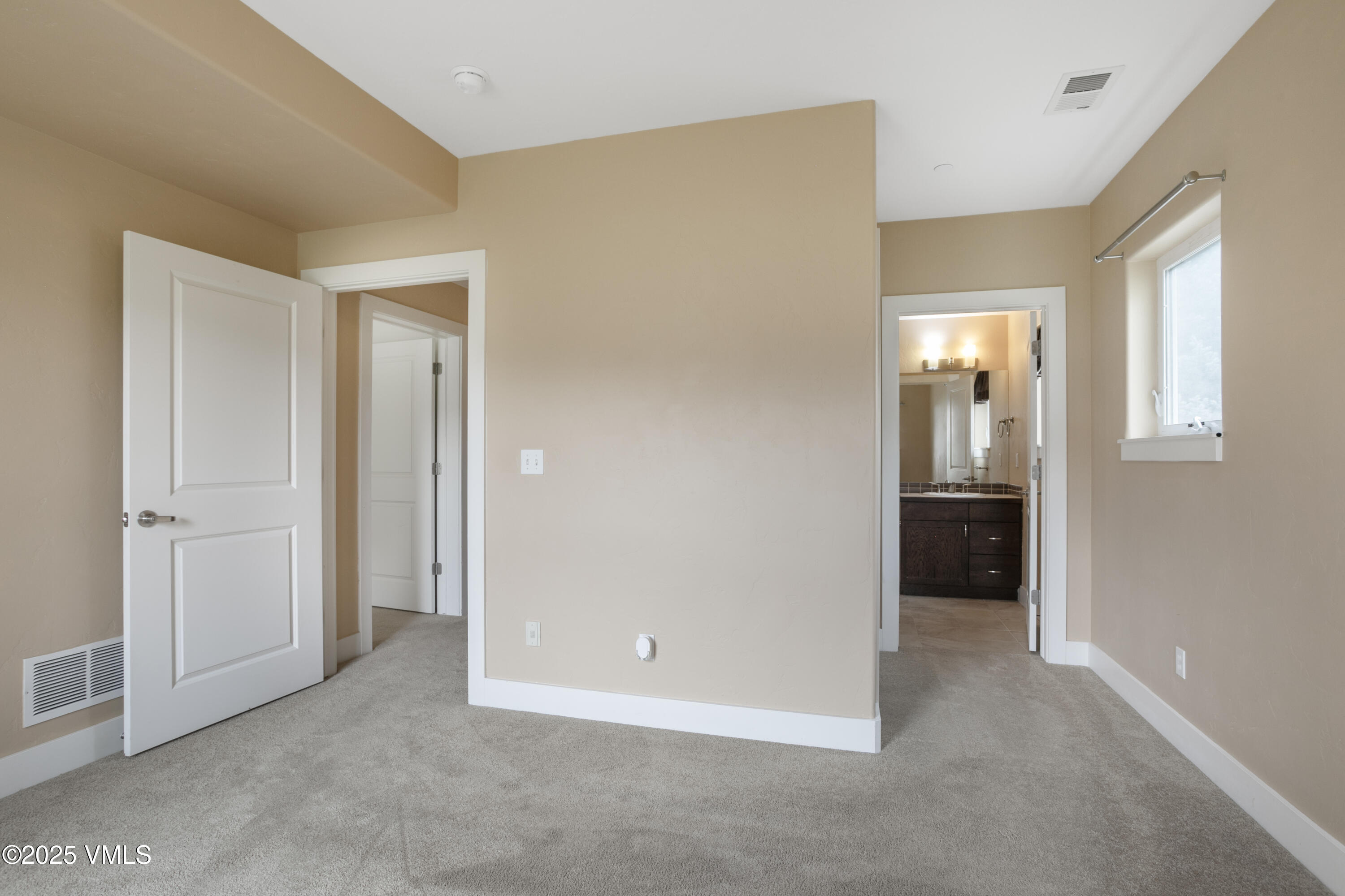 80 Freestone Road, Unit B201 Eagle, CO 81631 - Photo 18 of 24 an empty room with windows and entrance
