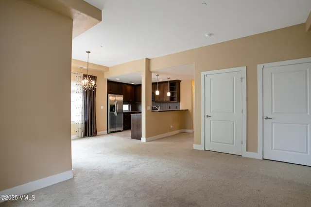 a view of a big room with closet and a bathroom