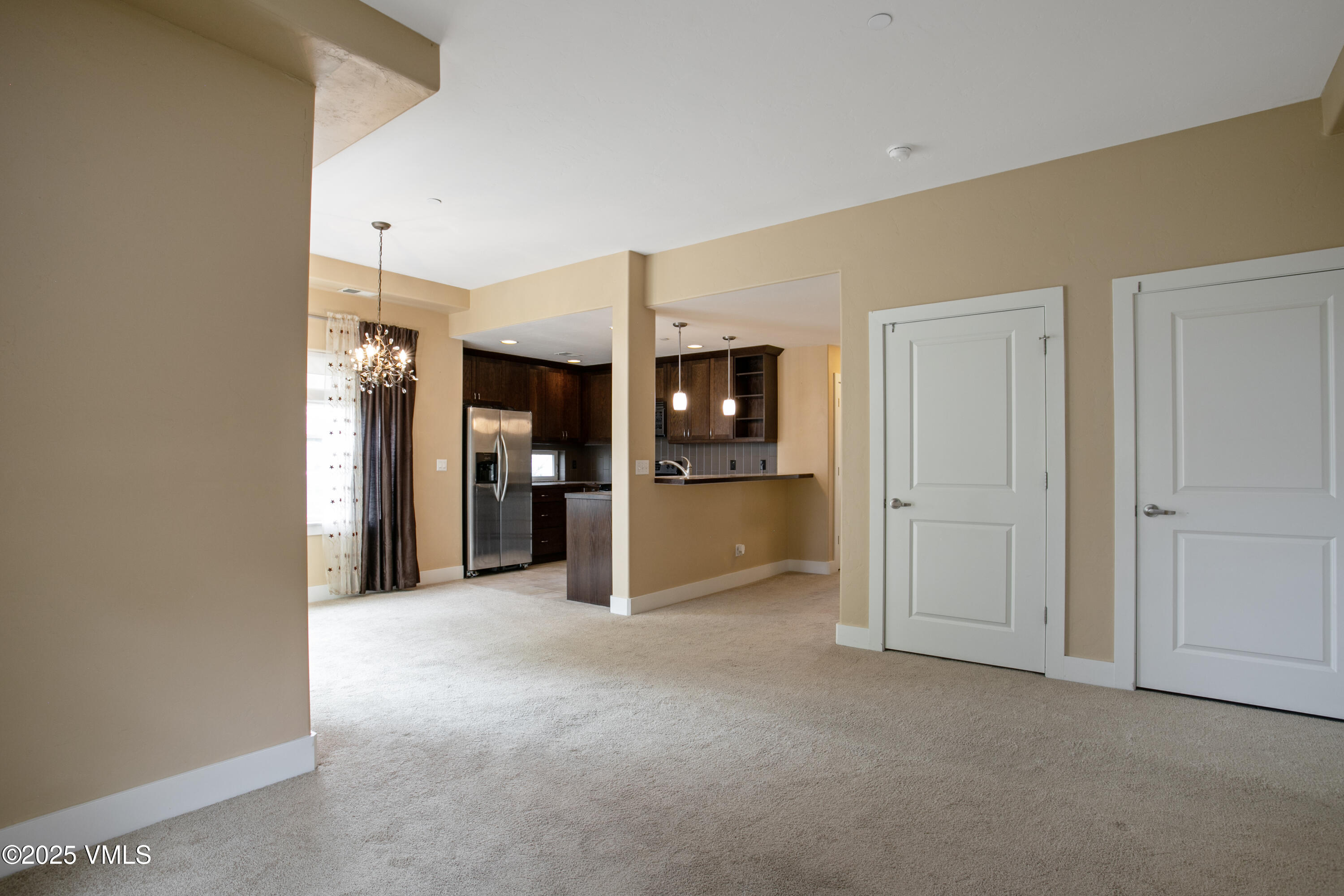 80 Freestone Road, Unit B201 Eagle, CO 81631 - Photo 4 of 24 a view of a big room with closet and a bathroom