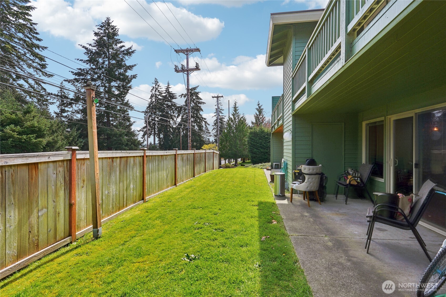 1450 Alameda Avenue, Unit 1 Fircrest, WA 98466 - Photo 16 of 19 a view of a house with backyard and sitting area