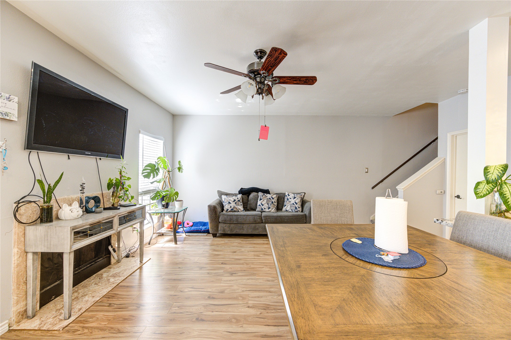3800 Tanglewilde Street, Unit 803 Houston, TX 77063 - Photo 4 of 36 a living room with furniture and a flat screen tv