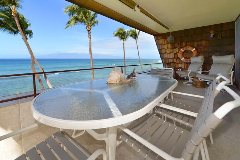 3741 Lower Honoapiilani Road, Unit 301 Lahaina, HI 96761 - Photo 8 of 18 a room with table and chairs
