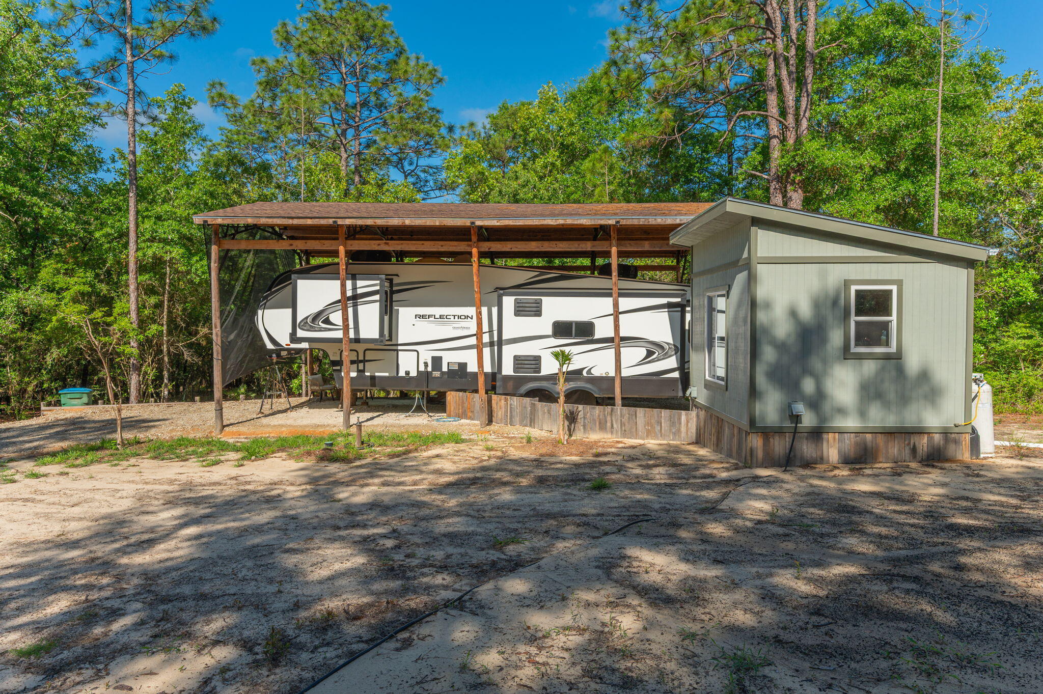 4449 Yellow Bluff Road Crestview, FL 32539 - Photo 4 of 42 a view of a house with backyard and a area