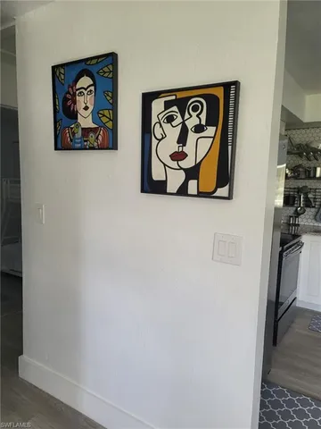 a wall with a painting on the wall