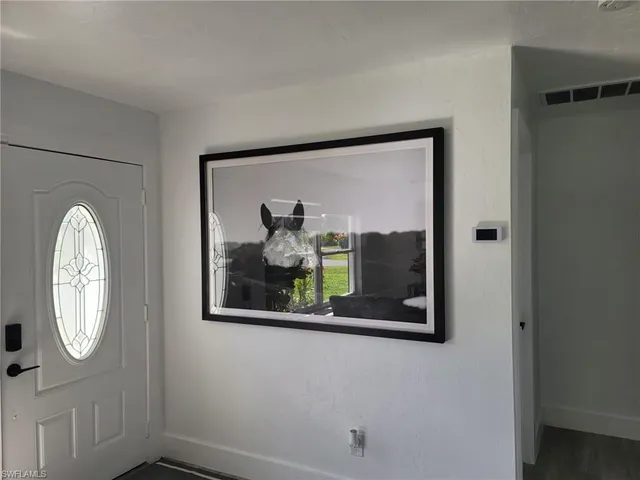 a front view of a house with window