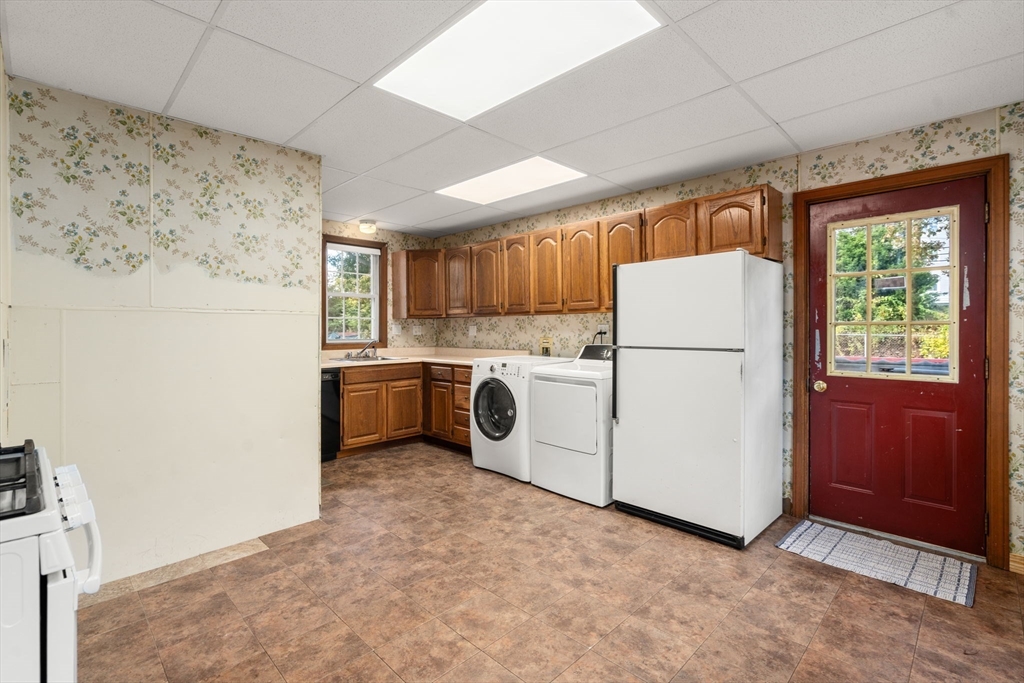 106 Norfolk Avenue Swampscott, MA 01907 - Photo 12 of 26 a utility room with dryer and washer