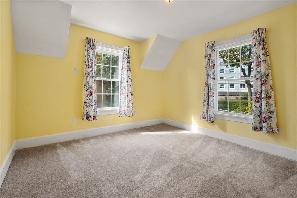 106 Norfolk Avenue Swampscott, MA 01907 - Photo 16 of 26 a view of an empty room with a window