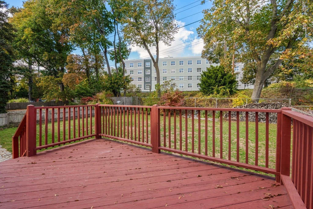 106 Norfolk Avenue Swampscott, MA 01907 - Photo 22 of 26 a view of balcony with wooden floor and fence