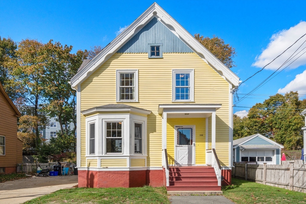 106 Norfolk Avenue Swampscott, MA 01907 - Photo 25 of 26 a front view of a house with a yard