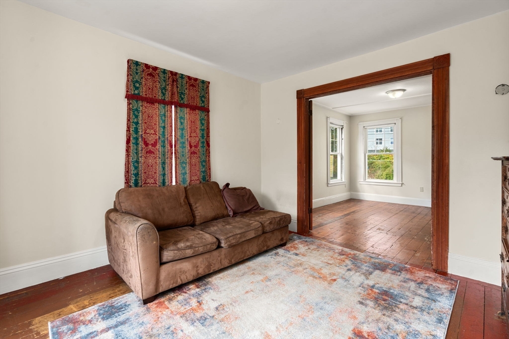 106 Norfolk Avenue Swampscott, MA 01907 - Photo 6 of 26 a living room with furniture and a window