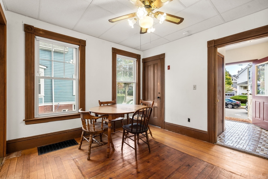 106 Norfolk Avenue Swampscott, MA 01907 - Photo 9 of 26 a view of a dining room with furniture window and wooden floor