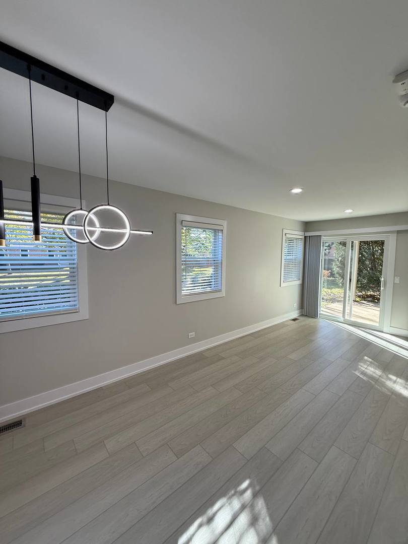 2403 Mallow Court, Unit Z1 Schaumburg, IL 60107 - Photo 7 of 17 a view of an empty room with a window
