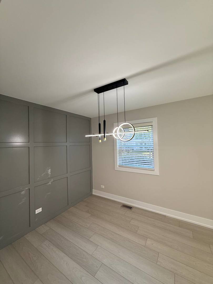 2403 Mallow Court, Unit Z1 Schaumburg, IL 60107 - Photo 8 of 17 a view of an empty room with a window