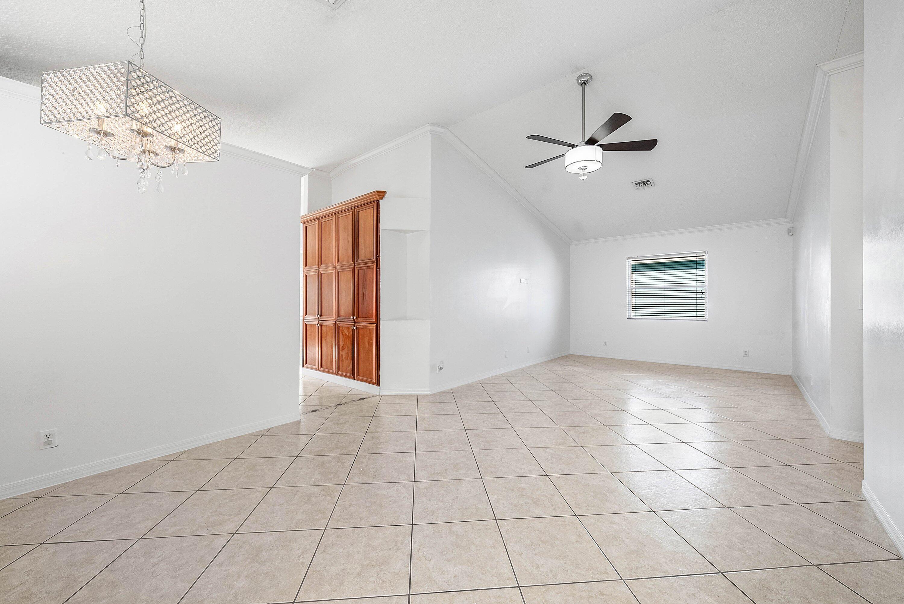177 Heming Way Boynton Beach, FL 33426 - Photo 6 of 28 a view of an empty room with a window