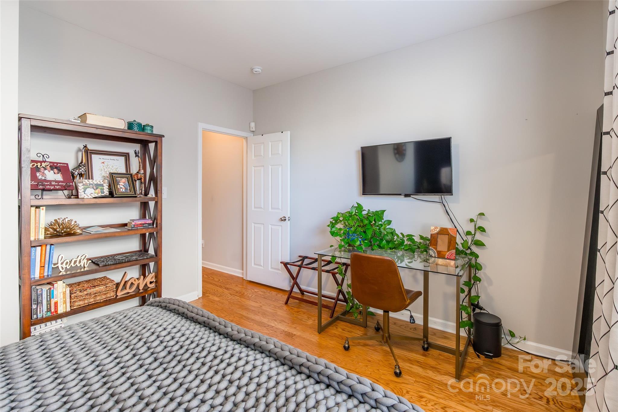 15127 Taylor Ridge Lane Charlotte, NC 28273 - Photo 22 of 42 a living room with furniture and a flat screen tv
