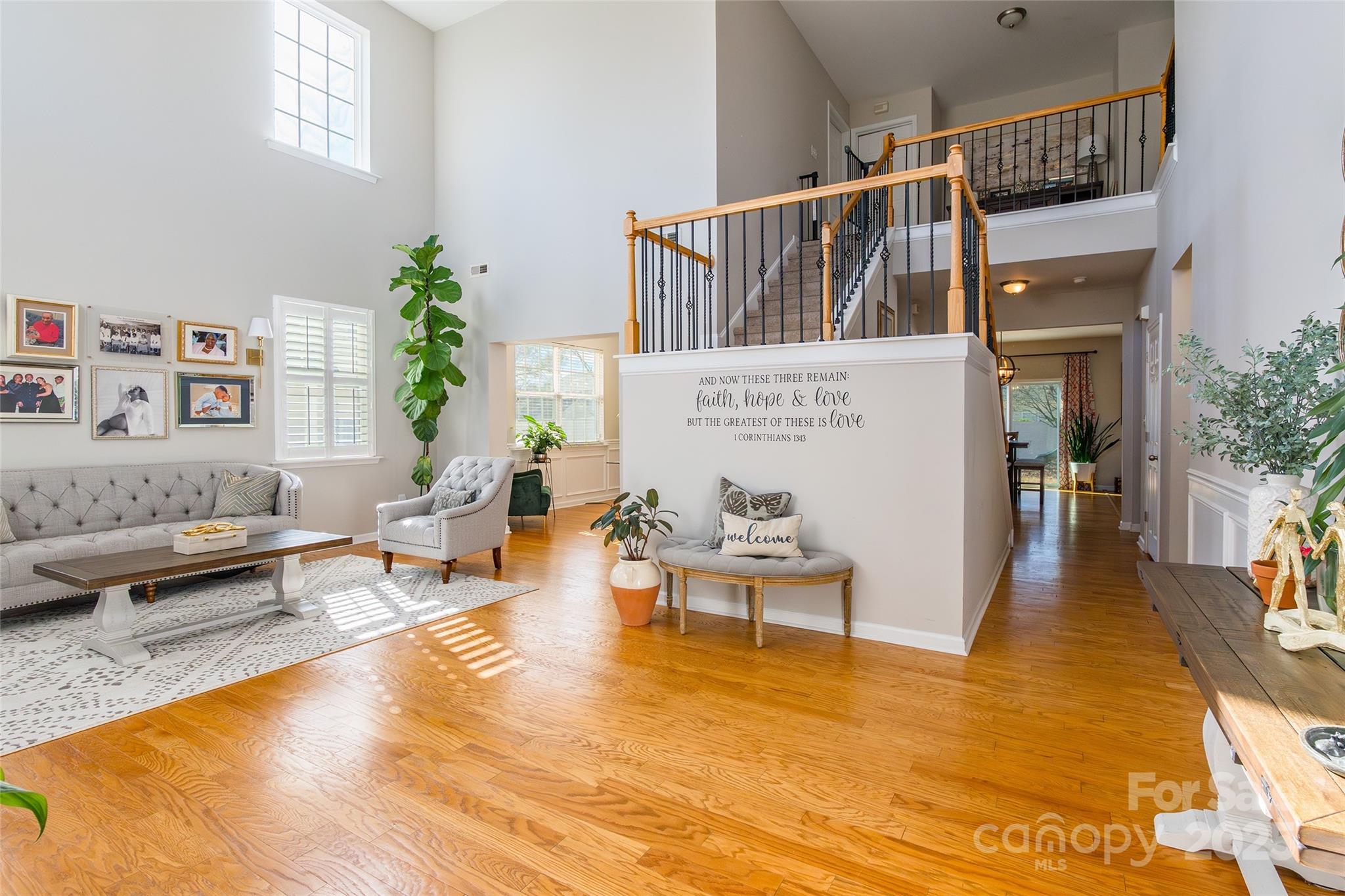 15127 Taylor Ridge Lane Charlotte, NC 28273 - Photo 3 of 42 a living room with furniture and a rug
