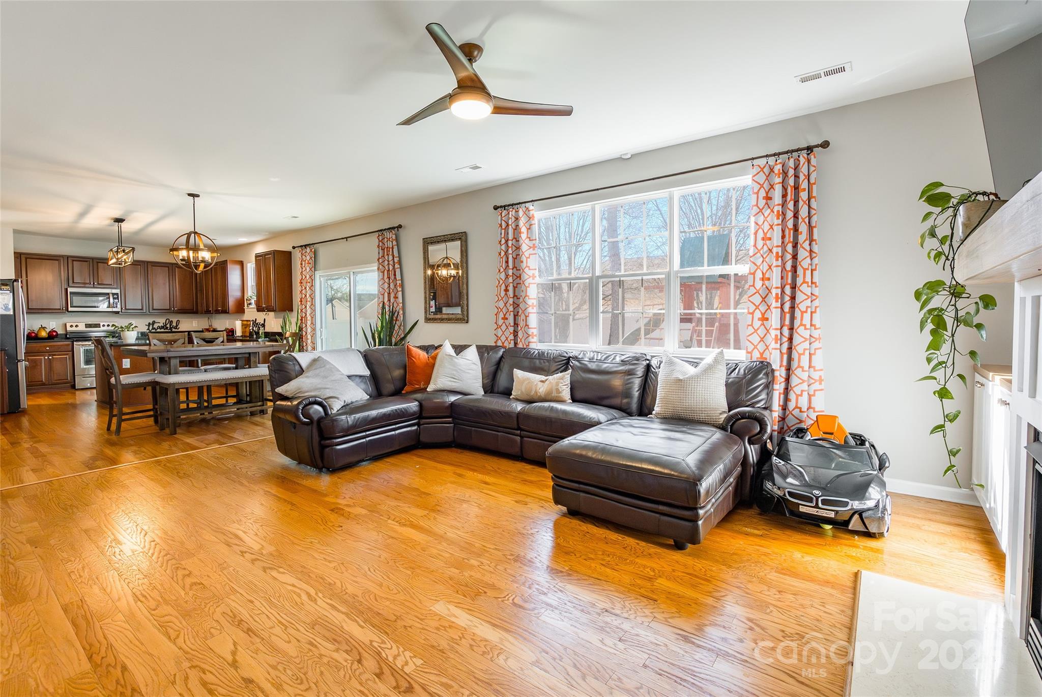 15127 Taylor Ridge Lane Charlotte, NC 28273 - Photo 9 of 42 a living room with furniture and a large window