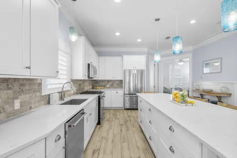 a living room with furniture a rug and a window