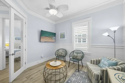 a spacious bedroom with a large bed and a window