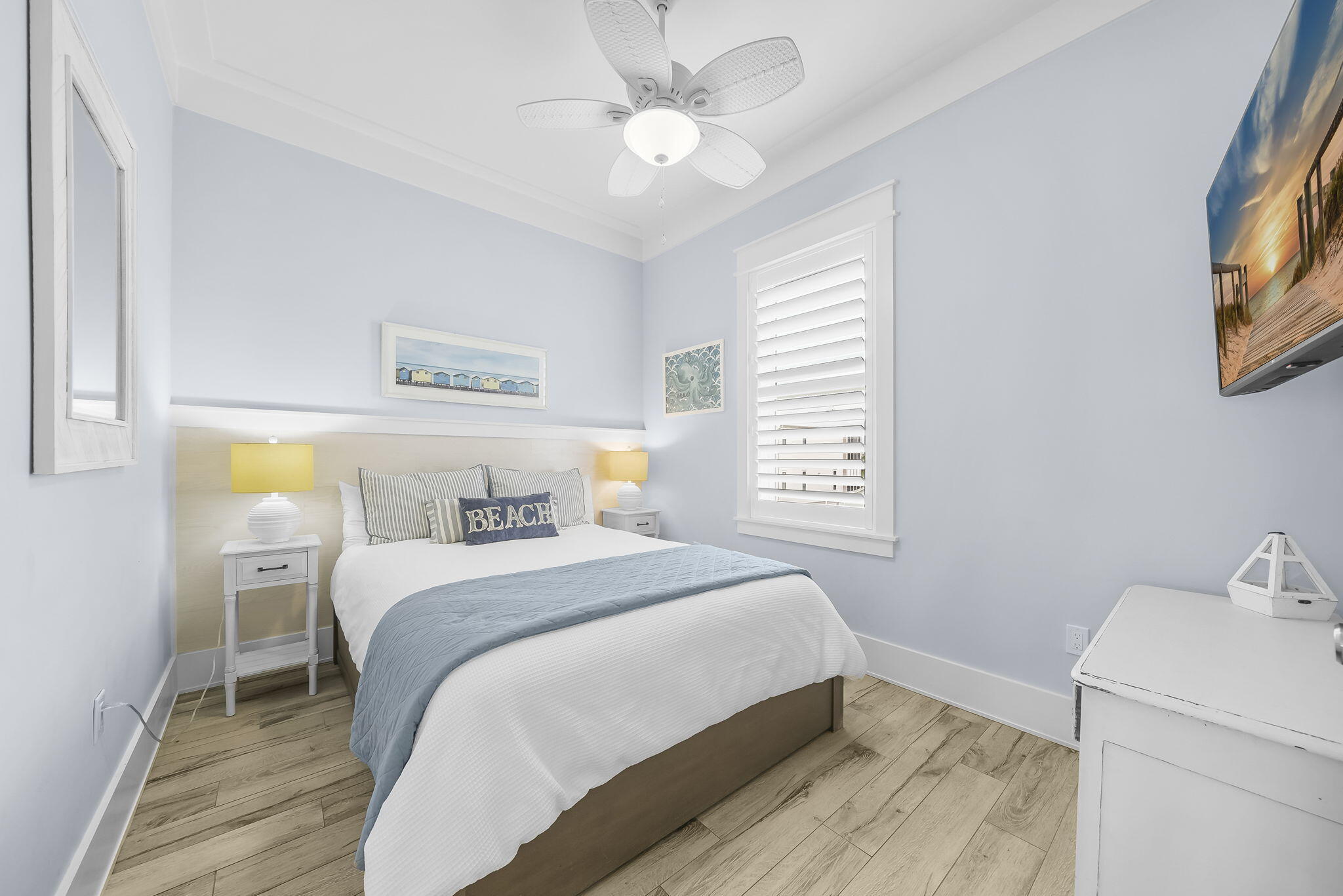 93 Emerald Cove Lane North Inlet Beach, FL 32461 - Photo 18 of 68 a bedroom with a bed and a chandelier