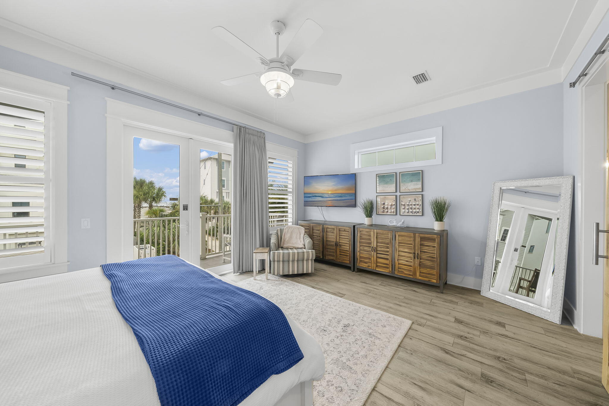 93 Emerald Cove Lane North Inlet Beach, FL 32461 - Photo 22 of 68 a spacious bedroom with a large bed and a window