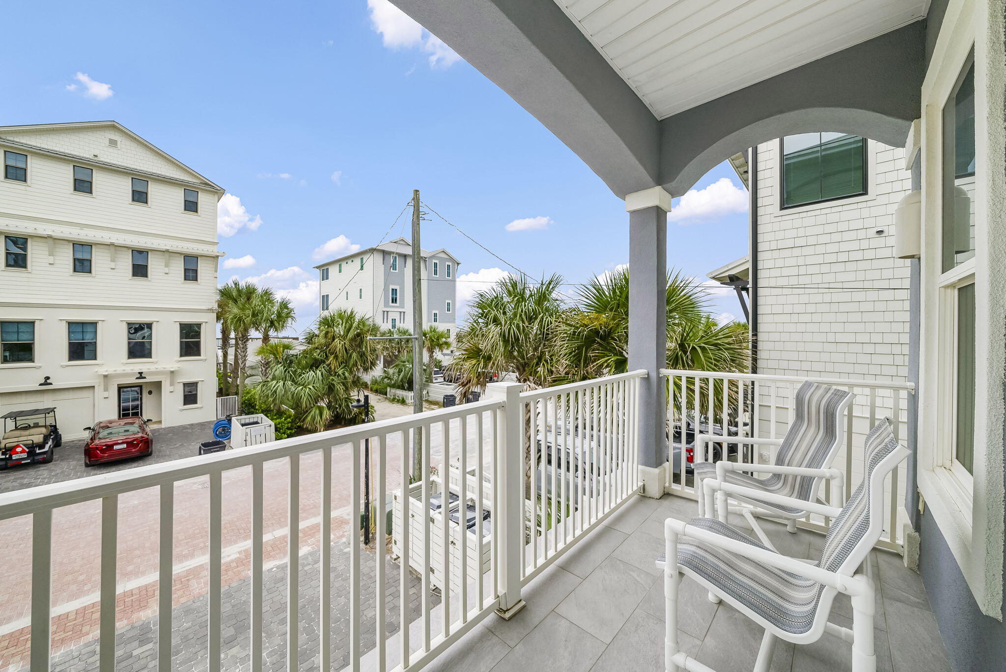 93 Emerald Cove Lane North Inlet Beach, FL 32461 - Photo 24 of 68 a view of a building from a porch