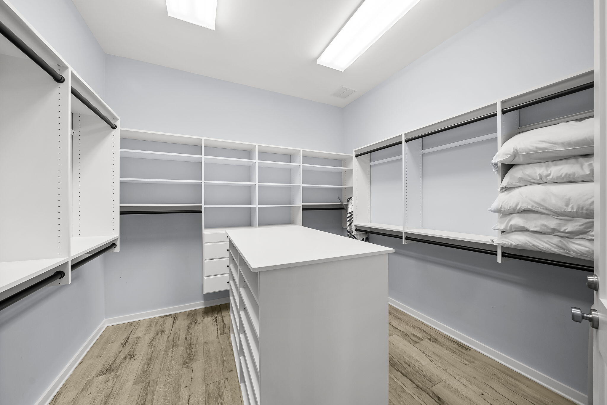 93 Emerald Cove Lane North Inlet Beach, FL 32461 - Photo 27 of 68 a view of walk in closet with empty racks