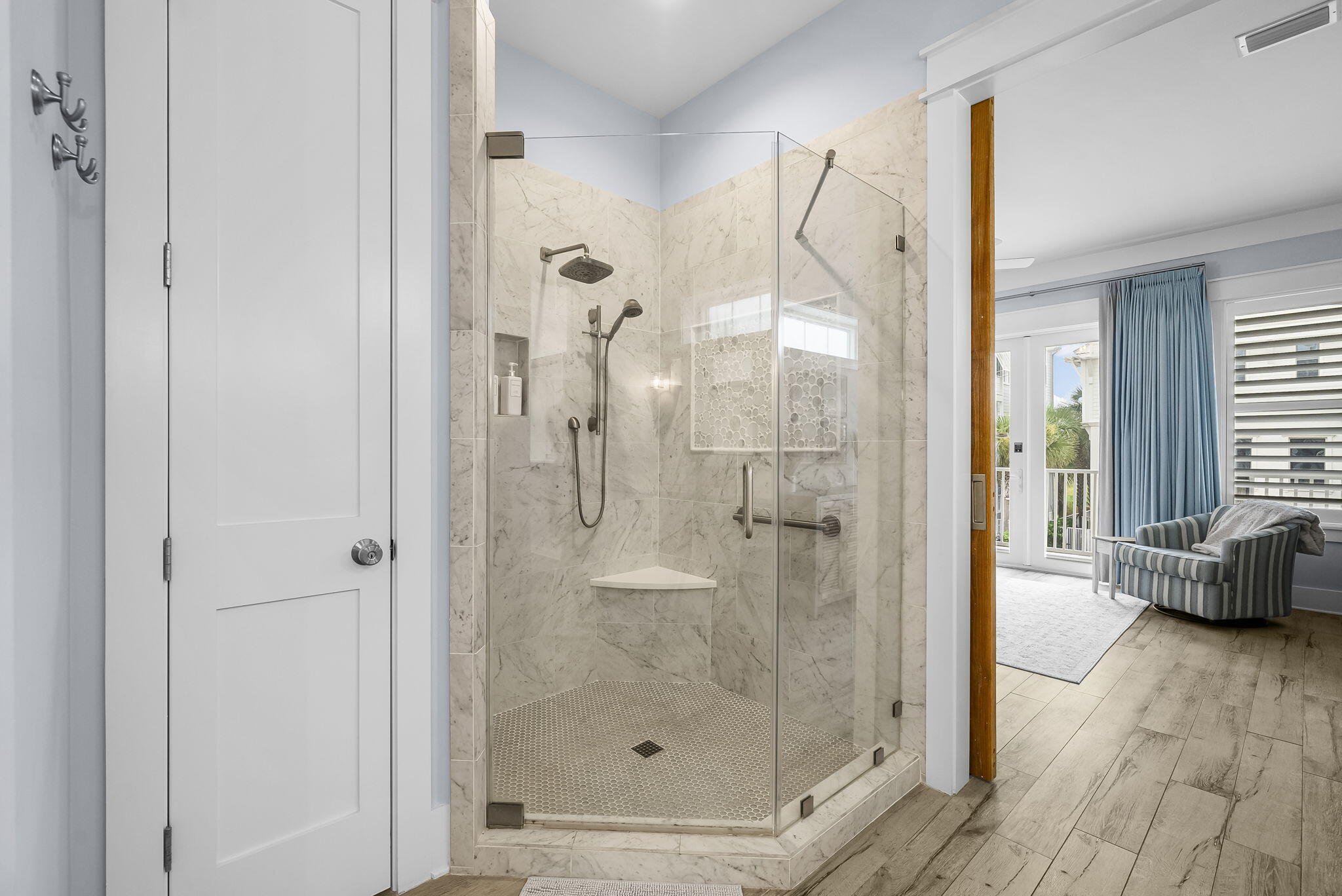 93 Emerald Cove Lane North Inlet Beach, FL 32461 - Photo 28 of 68 a bathroom with a glass shower door