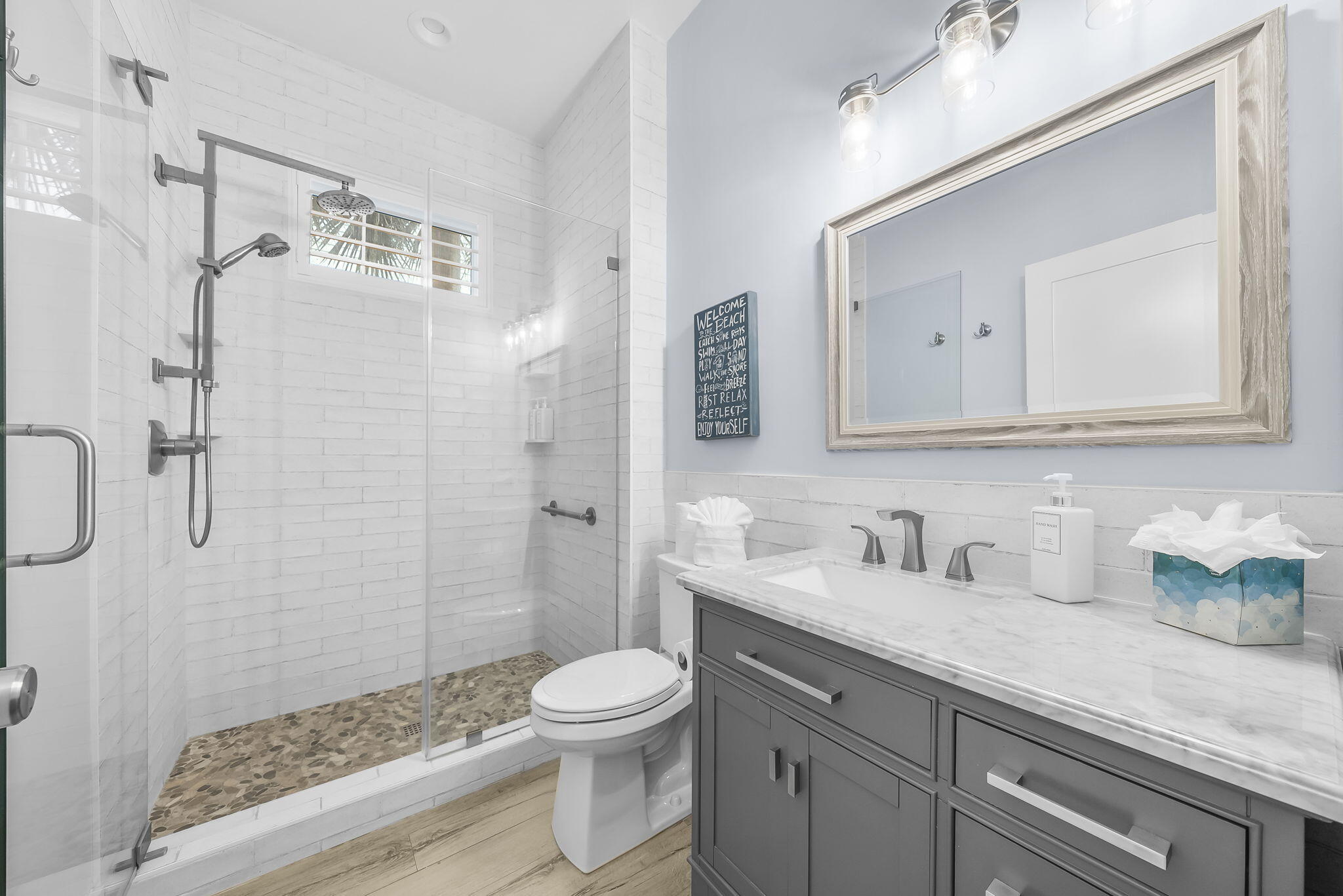 93 Emerald Cove Lane North Inlet Beach, FL 32461 - Photo 29 of 68 a bathroom with a sink a toilet and shower