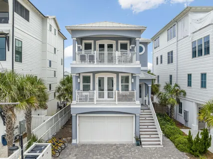 a view of a balcony with furniture
