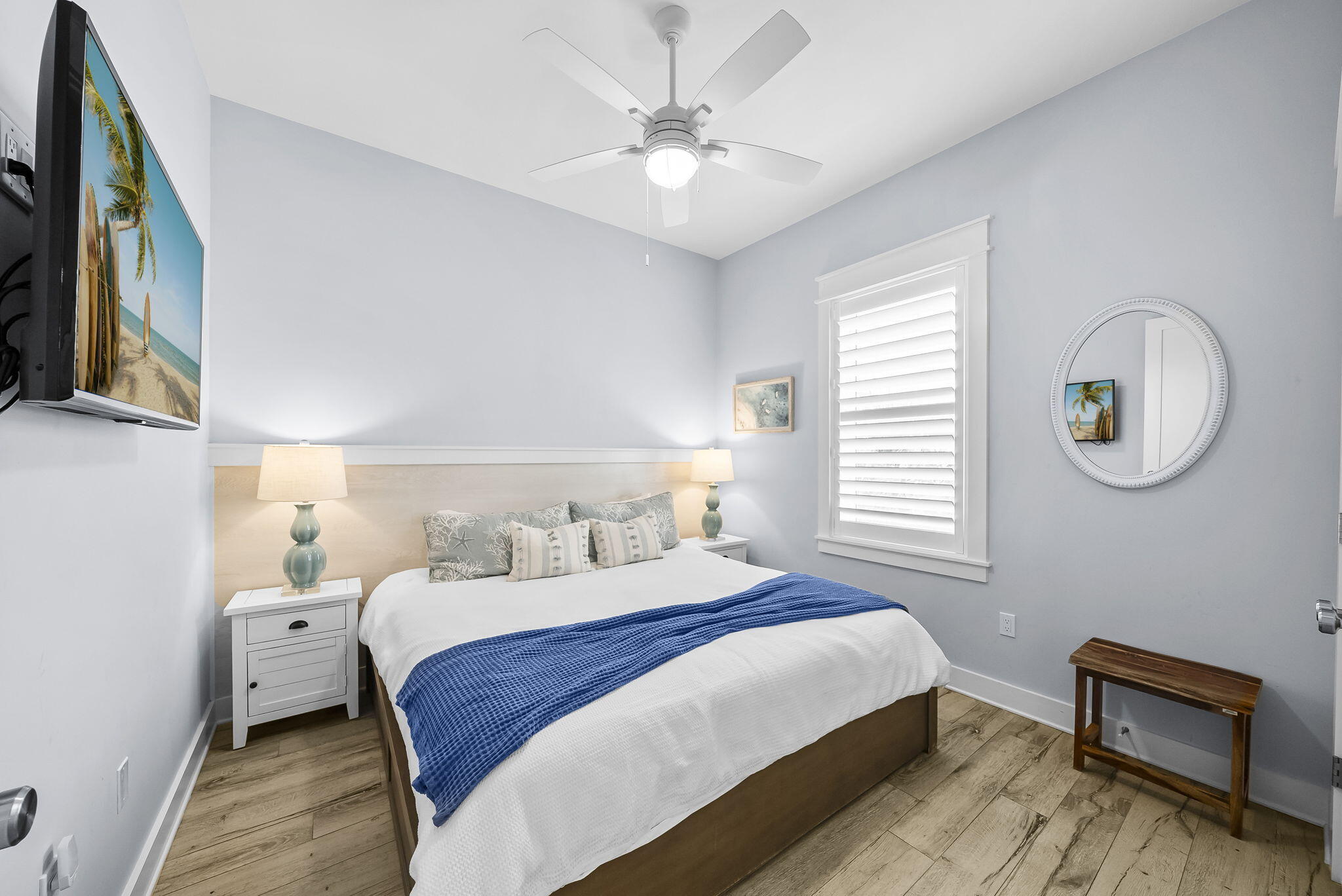 93 Emerald Cove Lane North Inlet Beach, FL 32461 - Photo 31 of 68 a bedroom with a bed and a chandelier