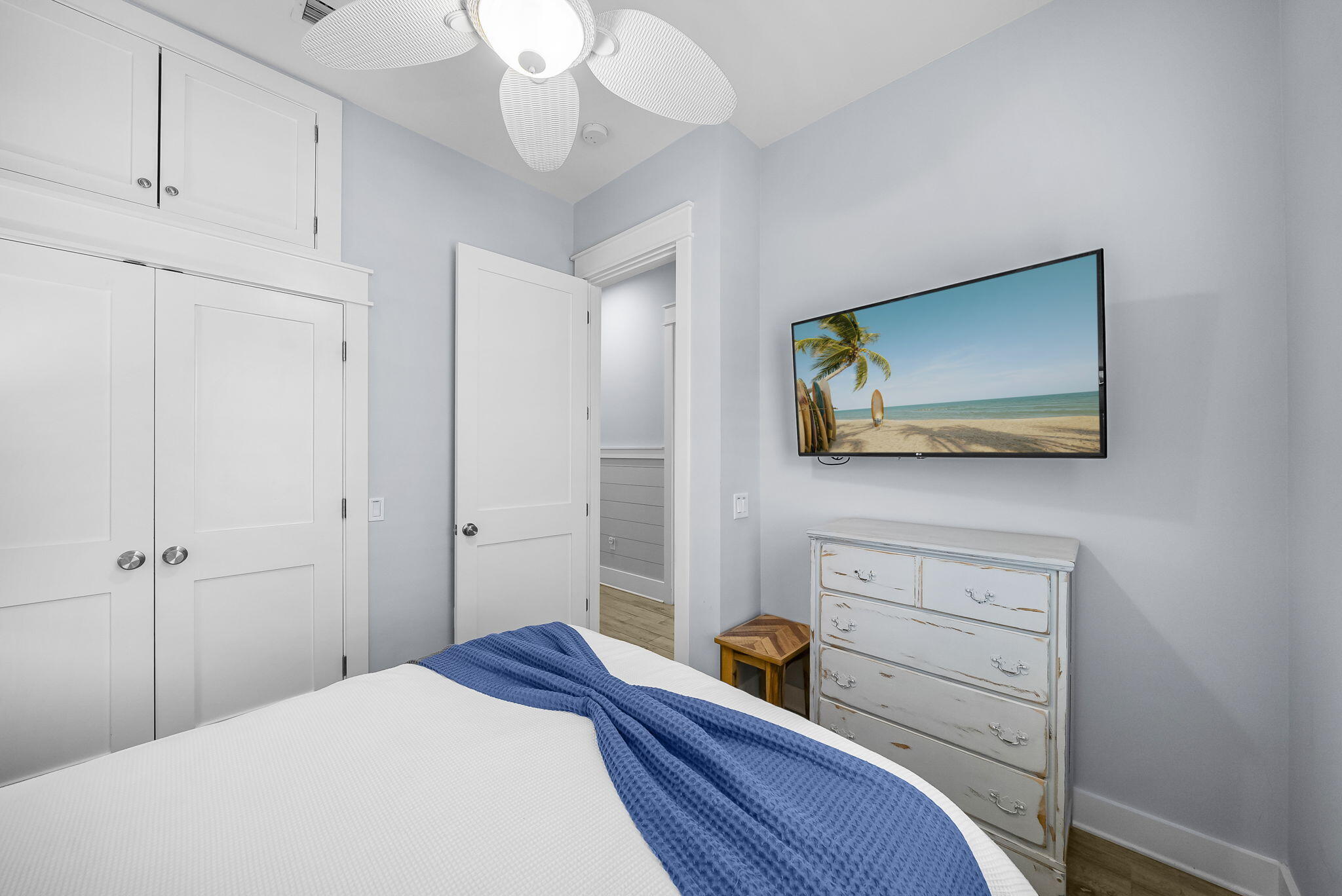 93 Emerald Cove Lane North Inlet Beach, FL 32461 - Photo 33 of 68 a bedroom with a bed and a dresser in it