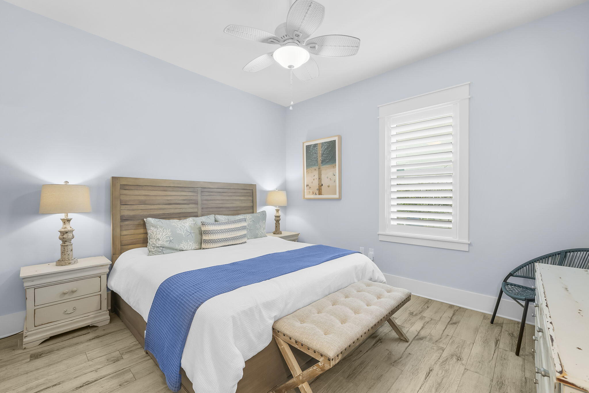 93 Emerald Cove Lane North Inlet Beach, FL 32461 - Photo 37 of 68 a bedroom with a bed and a chandelier