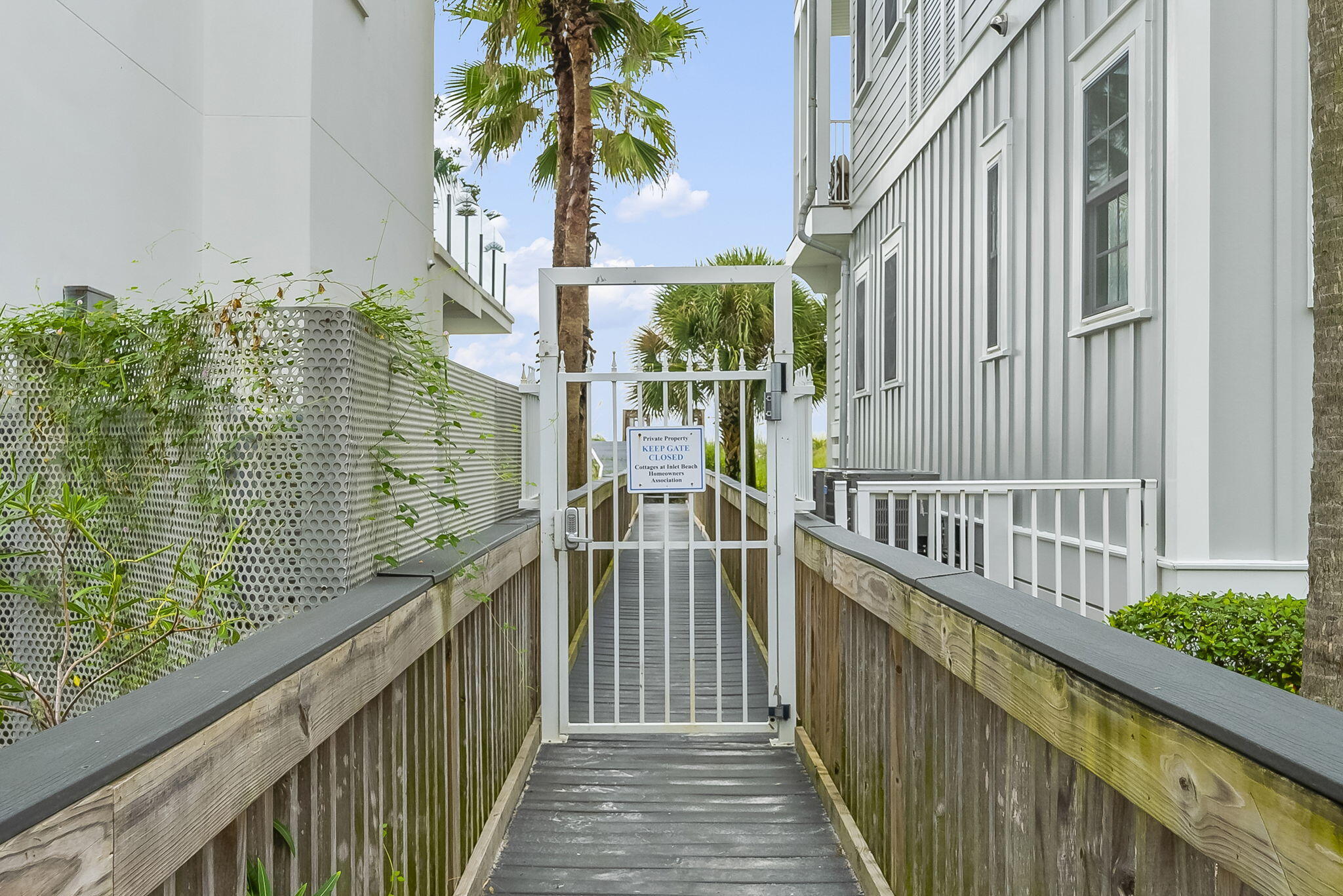 93 Emerald Cove Lane North Inlet Beach, FL 32461 - Photo 46 of 68 a view of a balcony with wooden floor