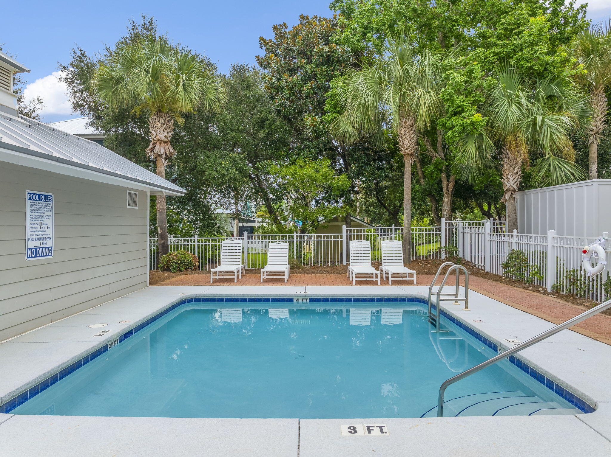 93 Emerald Cove Lane North Inlet Beach, FL 32461 - Photo 57 of 68 a view of a wooden deck and a backyard