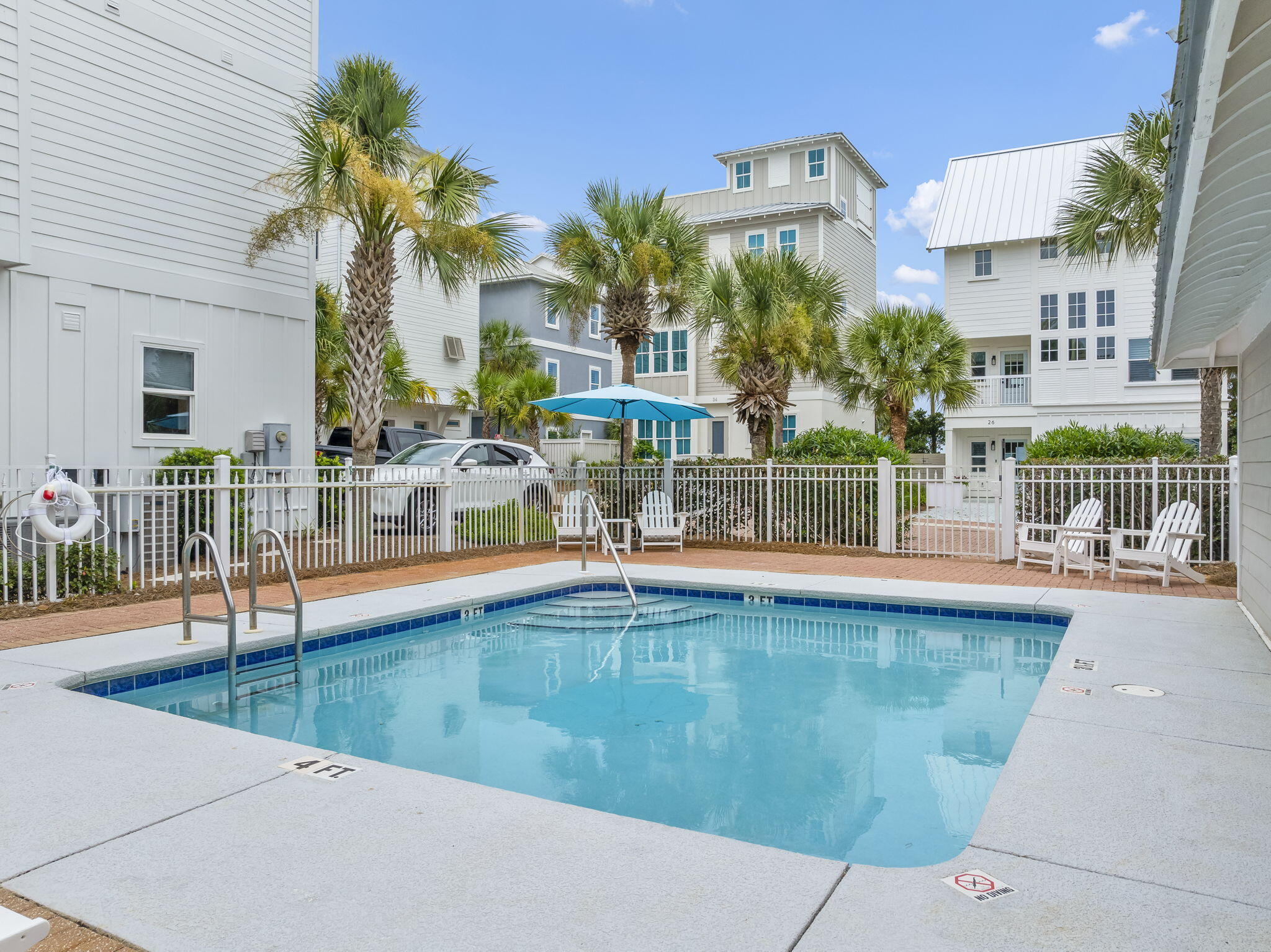93 Emerald Cove Lane North Inlet Beach, FL 32461 - Photo 58 of 68 a view of a swimming pool with outdoor seating